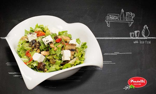 Салат Ясмина. Свежий зеленый салат с маринованными овощами на гриле, брынза в оливковом масле и ригано, подправленные соусом Песто (370 гр) - 6,60 Левов